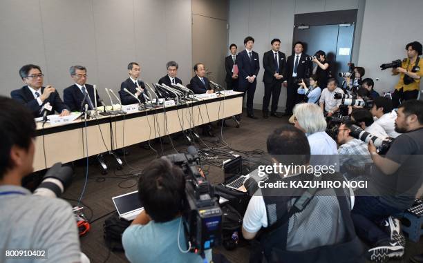 Chairman and CEO of Japanese airbag maker Takata Corp., Shigehisa Takada , answers questions during a press conference in Tokyo on June 26, 2017....