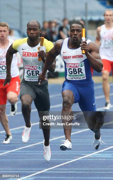 Harry Aikines-Aryeetey of Great Britain wins the 4x100m Relay in front of Aleixo Platini Menga of Germany on day 2 of the 2017 European Athletics...