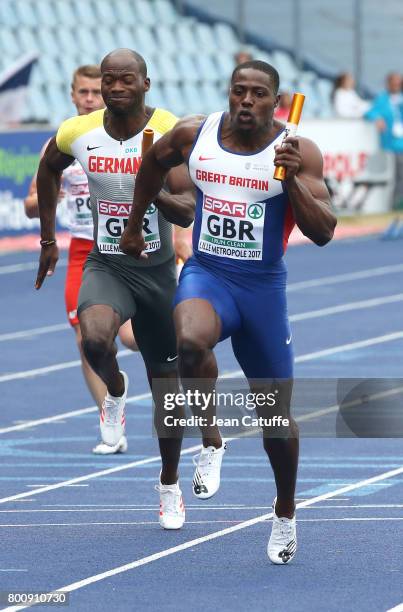 Harry Aikines-Aryeetey of Great Britain wins the 4x100m Relay in front of Aleixo Platini Menga of Germany on day 2 of the 2017 European Athletics...