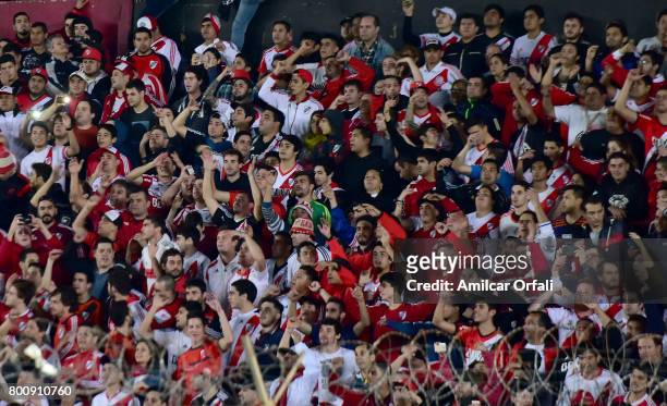 Fans of River Plate cheer for their team during a match between Colon and River Plate as part of Torneo Primera Division 2016/17 at Brigadier Lopez...