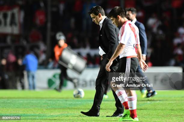 Marcelo Gallardo, coach of River Plate and Luis Olivera leave the field after a match between Colon and River Plate as part of Torneo Primera...
