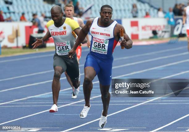 Harry Aikines-Aryeetey of Great Britain wins the 4x100m Relay in front of Aleixo Platini Menga of Germany on day 2 of the 2017 European Athletics...