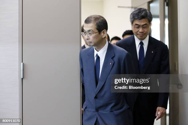 Shigehisa Takada, chairman and president of Takata Corp., center, arrives at a news conference in Tokyo, Japan, on Monday, June 26, 2017. Takata...