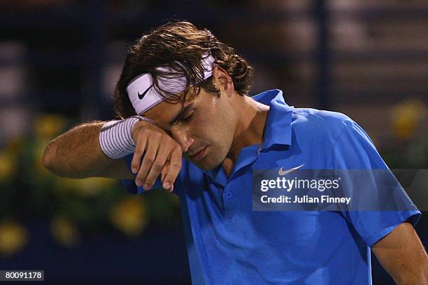 Frustrated Roger Federer of Switzerland in his match against Andy Murray of Great Britain pose for photos before their match during the ATP Barclays...