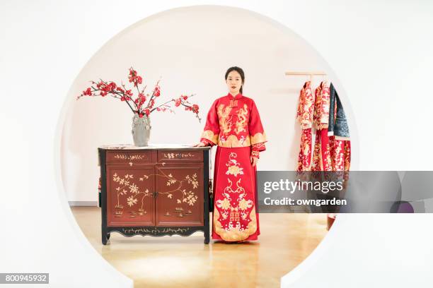 beautiful bride in chinese traditional wedding dress - silk china stock pictures, royalty-free photos & images