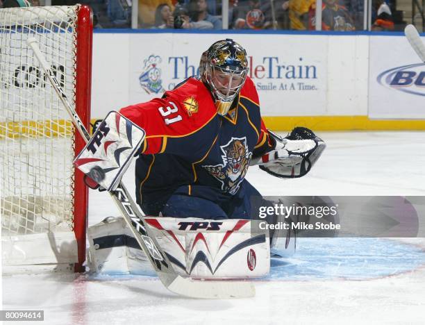 Craig Anderson of the Florida Panthers makes a stick save against the New York Islanders on March 2, 2008 at Nassau Coliseum in Uniondale, New York....