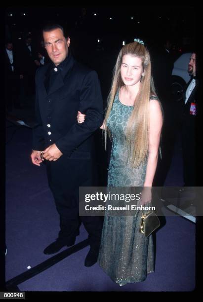 Actor Steven Seagal and wife Arisa Wolf attend Elizabeth Taylor's 65th birthday party February 16, 1997 in Los Angeles, CA. Two-time Academy Award...