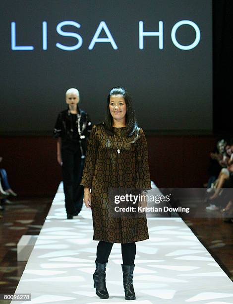 Designer Lisa Ho walks the catwalk following her collection show during the Fashion Collections 1 show as part of the L'Oreal Melbourne Fashion...