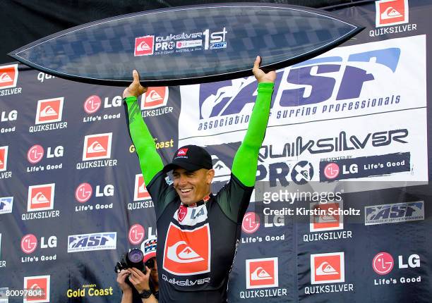 Kelly Slater of the United States of America celebrates victory after the final of the Quiksilver Pro Gold Coast at Snapper Rocks on March 4, 2008 on...