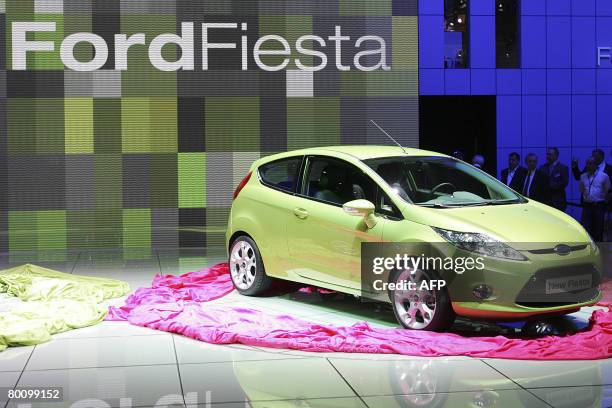 The new Ford Fiesta car is displayed on March 4, 2008 during the press days at the Geneva car show. AFP PHOTO / NICHOLAS RATZENBOECK