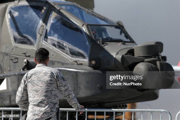 Apache Longbow helicopter on the tarmac on the last day of the International Paris Air Show at Le Bourget Airport, near Paris, on June 25, 2017. This...