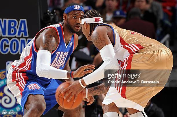 LeBron James of the Eastern Conference plays defense on Carmelo Anthony of the Western Conference during the 2008 NBA All-Star Game part of 2008 NBA...
