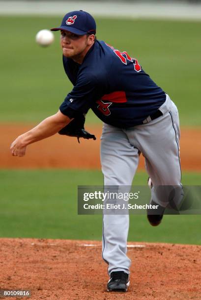 Pitcher Aaron Laffey of the Cleveland Indians delivers a pitch against the Cincinnati Reds during a Spring Training game at Ed Smith Stadium on March...