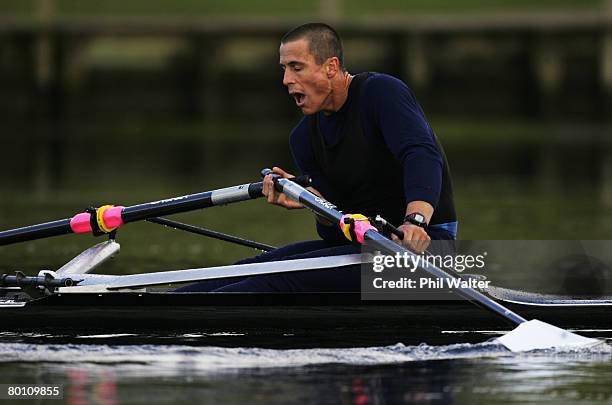 Rob Waddell shows his exhaustion on the finish line after loosing the last of three races against Mahe Drysdale during the Olympic single scull...
