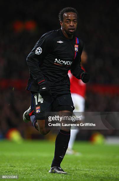 Sidney Govou of Lyon in action during the UEFA Champions League first knockout round second leg match between Manchester United and Lyon at Old...