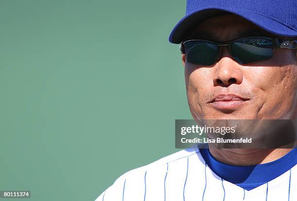 Kosuke Fukudome of the Chicago Cubs looks on during a Spring Training game against the Milwaukee Brewers at HoHoKam Park on March 4, 2008 in Mesa,...