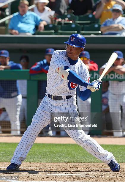 Kosuke Fukudome of the Chicago Cubs at bat during a Spring Training game against the Milwaukee Brewers at HoHoKam Park on March 4, 2008 in Mesa,...