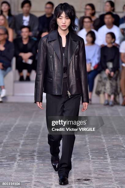 Model walks the runway during the Berluti Menswear Spring/Summer 2018 show as part of Paris Fashion Week on June 23, 2017 in Paris, France.