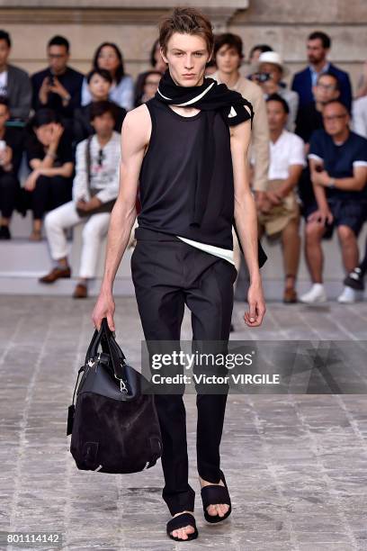 Model walks the runway during the Berluti Menswear Spring/Summer 2018 show as part of Paris Fashion Week on June 23, 2017 in Paris, France.