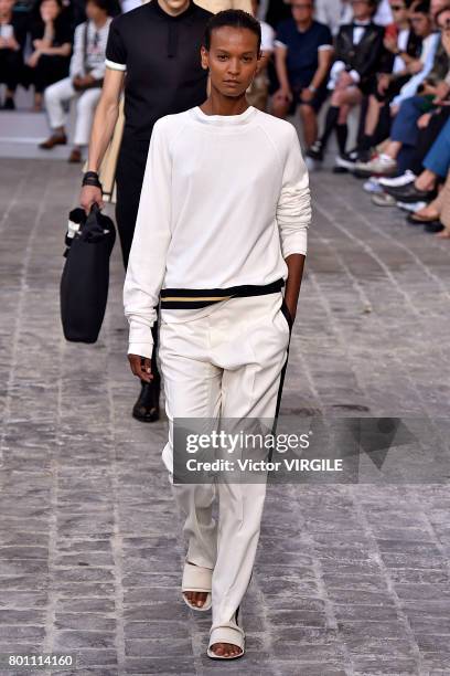 Model walks the runway during the Berluti Menswear Spring/Summer 2018 show as part of Paris Fashion Week on June 23, 2017 in Paris, France.