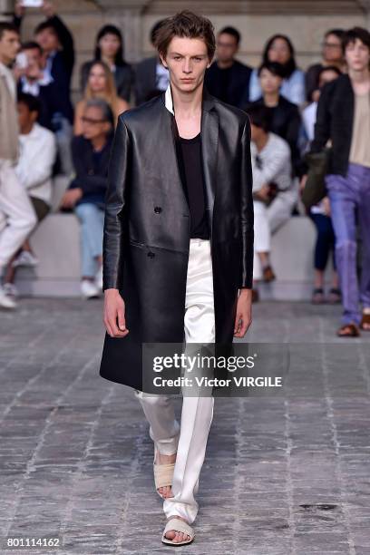 Model walks the runway during the Berluti Menswear Spring/Summer 2018 show as part of Paris Fashion Week on June 23, 2017 in Paris, France.