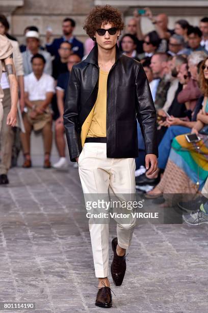 Model walks the runway during the Berluti Menswear Spring/Summer 2018 show as part of Paris Fashion Week on June 23, 2017 in Paris, France.