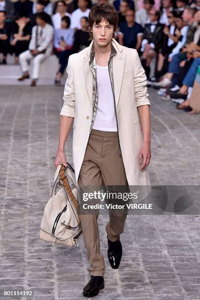 Model walks the runway during the Berluti Menswear Spring/Summer 2018 show as part of Paris Fashion Week on June 23, 2017 in Paris, France.