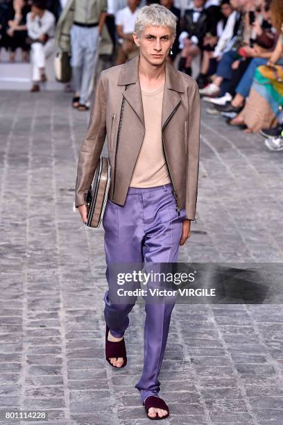 Model walks the runway during the Berluti Menswear Spring/Summer 2018 show as part of Paris Fashion Week on June 23, 2017 in Paris, France.