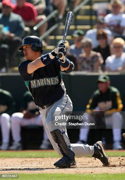 Kenji Johjima of the Seattle Mariners bats against the Oakland A's on March 4, 2008 at Phoenix Muncipal Stadium in Phoenix, Arizona. The A's won 9-6.