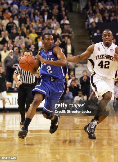 Nolan Smith of the Duke Blue Devils drives the ball against the Wake Forest Demon Deacons during their game at Lawrence Joel Coliseum on February 17,...