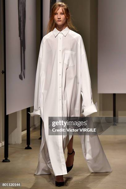 Model walks the runway during the Juun J Menswear Spring/Summer 2018 show as part of Paris Fashion Week on June 23, 2017 in Paris, France.