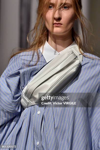 Model walks the runway during the Juun J Menswear Spring/Summer 2018 show as part of Paris Fashion Week on June 23, 2017 in Paris, France.