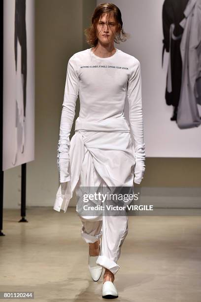 Model walks the runway during the Juun J Menswear Spring/Summer 2018 show as part of Paris Fashion Week on June 23, 2017 in Paris, France.