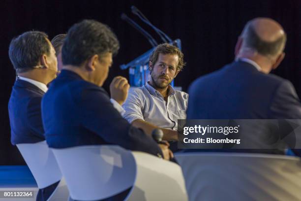 Robert Gentz, co-founder of Zalando SE, center, looks on during a panel session at the 61st Global Summit of the Consumer Goods Forum in Berlin,...