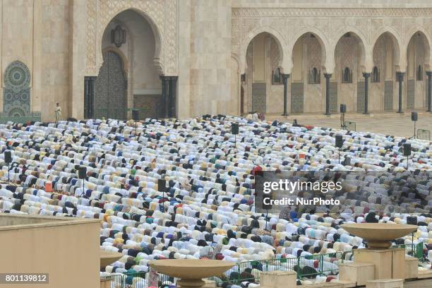 Moroccan Muslims gather to celebrate Eid al-Fitr Prayer in Casablanca's Hassan II mosque. Muslims around the world celebrate Eid al-Fitr marking the...