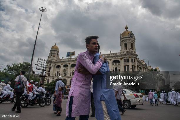 Indian Muslims exchange greetings after performing Eid al-Fitr prayer at the Red Road in Kolkata, India on June 26, 2017. Eid al-Fitr is a religious...