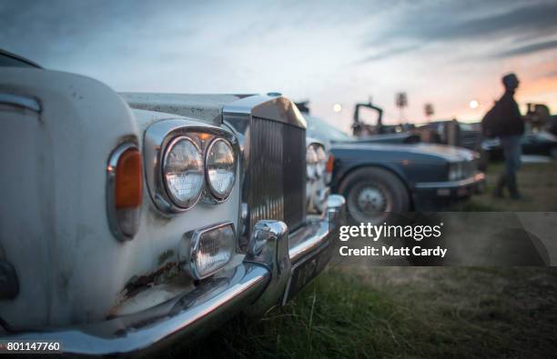 Man watches a film at Cinemaggedon at Glastonbury Festival site at Worthy Farm in Pilton on June 25, 2017 near Glastonbury, England. Glastonbury...