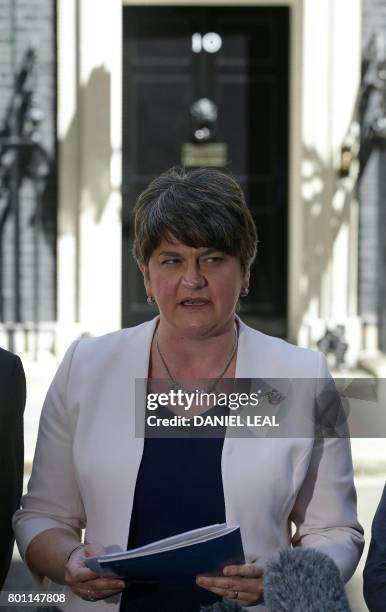 Democratic Unionist Party leader Arlene Foster addresses the media outside 10 Downing Street in central London on June 26 following her meeting with...
