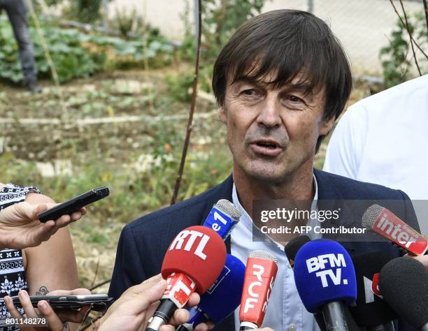 French Minister of Ecological and Inclusive Transition Nicolas Hulot answers to journalists' questions during a visit on June 26, 2017 in the new...