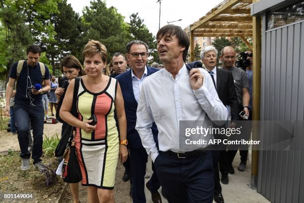 French Minister of Ecological and Inclusive Transition Nicolas Hulot visits the new district of Confluence in Lyon on June 26, 2017. / AFP PHOTO /...