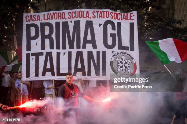 Thousands of members of Italian far-right movement CasaPound from all over Italy march with flags and shout slogans during a demonstration to protest...