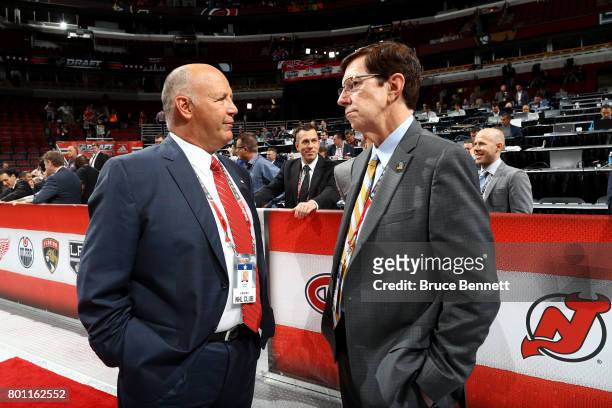 Montreal Canadiens coach Claude Julien and Nashville Predators General manager David Poile chat during the 2017 NHL Draft at the United Center on...