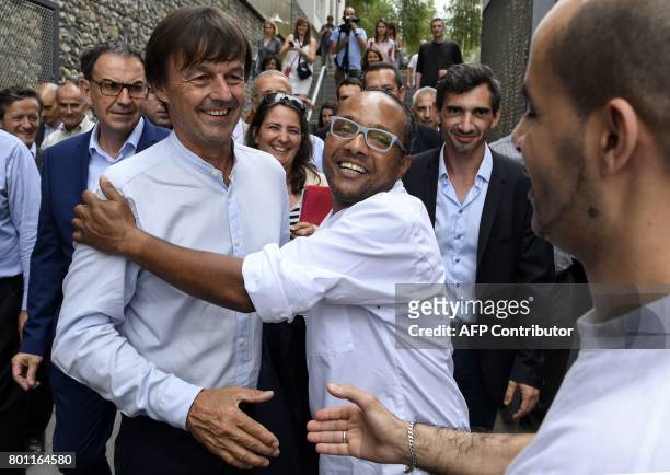 French Minister of Ecological and Inclusive Transition Nicolas Hulot is greeted during his visit on June 26, 2017 in the new district of Confluence...