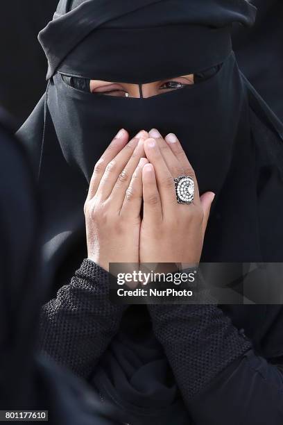 Sri Lankan muslim woman prays during an Eid al-Fitr event to mark the end of the holy fasting month of Ramadan in Colombo, Sri Lanka Monday 26 June...