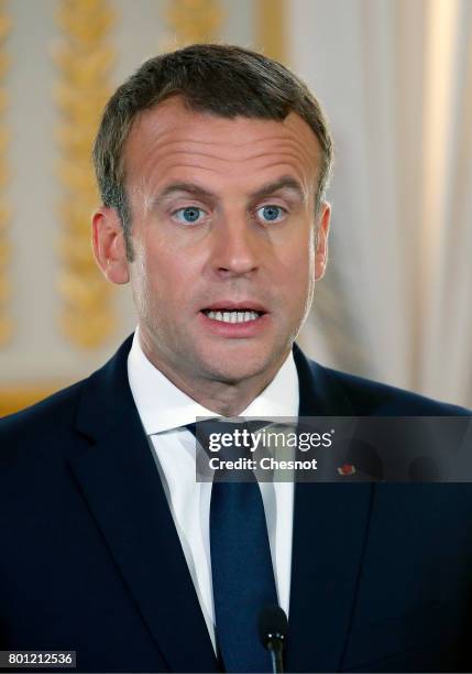 French President Emmanuel Macron makes a statement next to Ukrainian President Petro Poroshenko during a joint press conference after a meeting at...