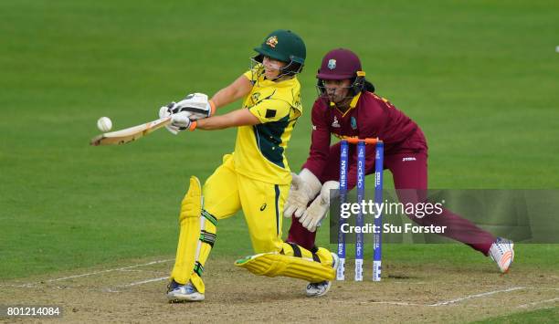 Australia batsman Nicole Bolton pulls a ball to the boundary watched by wicketkeeper Merissa Aguilleira during the ICC Women's World Cup 2017 match...