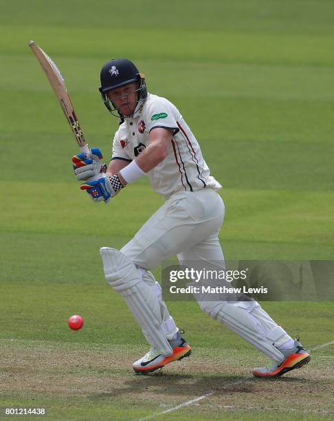 Sam Billings of Kent hits the ball towards the boundary during the Specsavers County Championship Division Two match between Nottinghamshire and Kent...