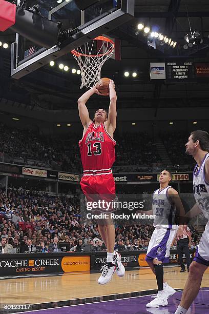 Joakim Noah of the Chicago Bulls goes up for the shot during the NBA game against the Sacramento Kings on February 2, 2008 at Arco Arena in...