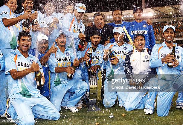 The Indian team celebrate after winning the Commonwealth Bank Series One Day International second final match between Australia and India at the...