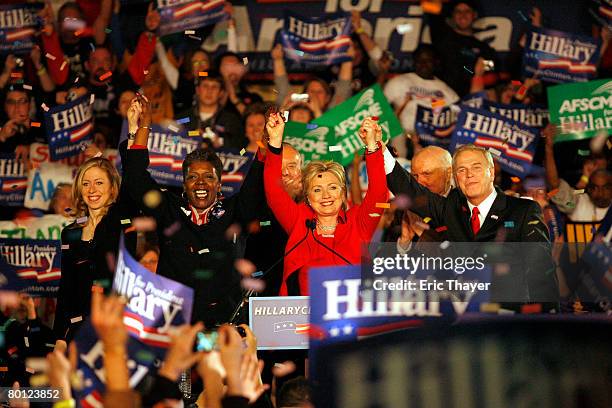 Democratic presidential hopeful Sen. Hillary Clinton celebrates during a primary election night party at The Columbus Athenaeum as her daughter...